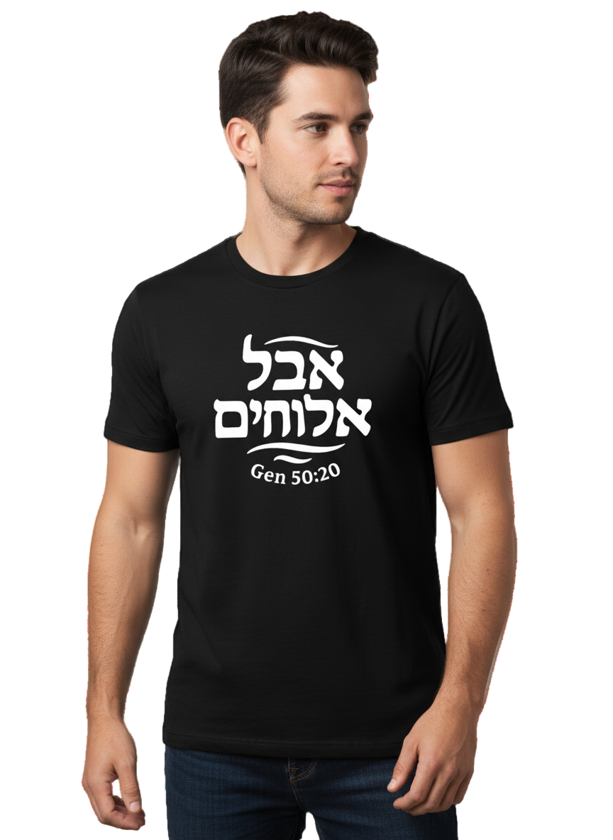 Man wearing a black t-shirt with white text on a light gray background